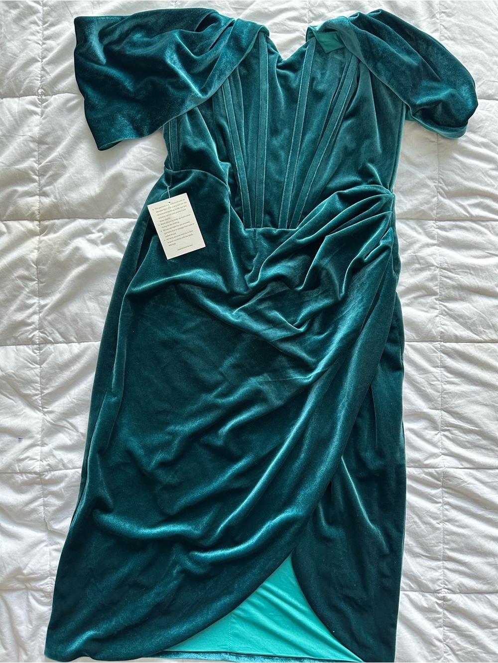 Velvet Bustier with off the shoulder sleeveTeal Dress with left thigh split.